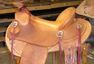 A Custom-made Western Saddle on a Wade Tree with basket pattern